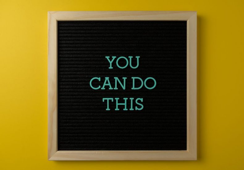 Inspirational message 'You Can Do This' displayed on a blackboard with a bold yellow backdrop.